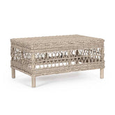 Vidéki vintage stílusú, natúr színű műrattan kerti asztal.